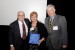 Dr. Nagib Callaos, General Chair, and Prof. Grandon Gill, Chair of the Award Ceremony, giving Dr. Risa Blair an award "In Appreciation for Delivering a Great Keynote Address at a Plenary Session."